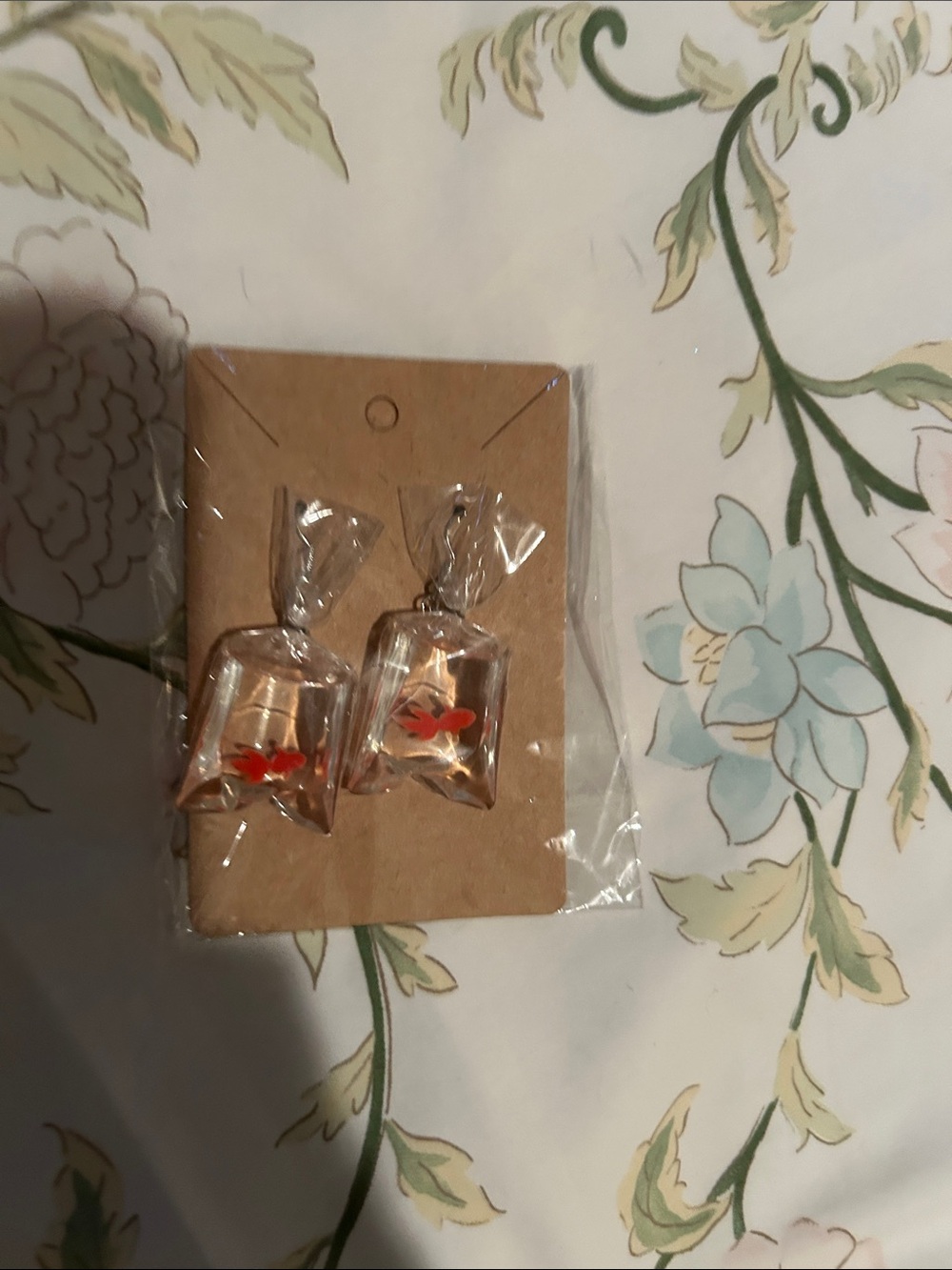 Gold Fish-in-Bag Earrings with Orange Accent